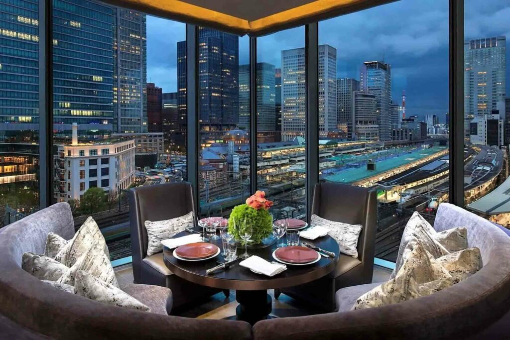 Four Seasons Hotel Tokyo At Marunouchi dining overlooking Tokyo Train Station