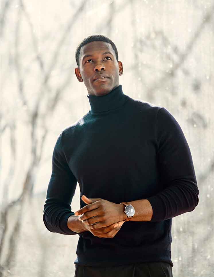 Sweater, TRUMAKER; trousers, Oliver & Rowan Bespoke; watch, ASTOR+BANKS