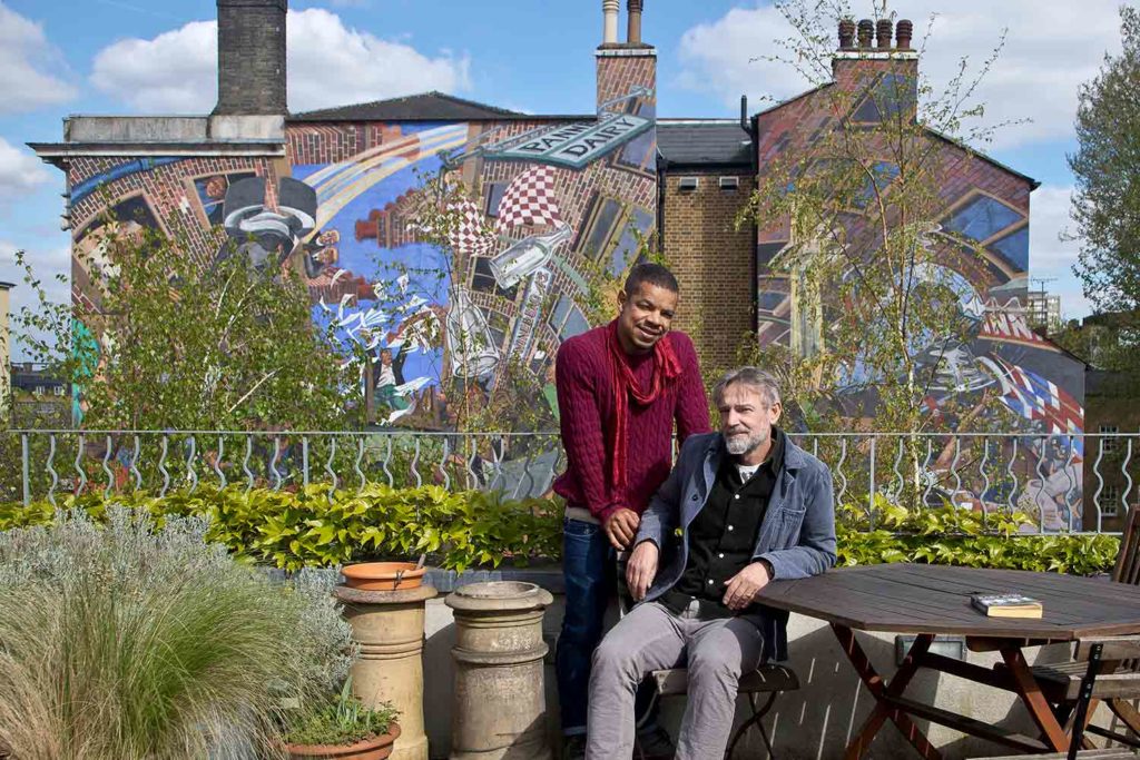 Owners in garden at Cable Street Inn