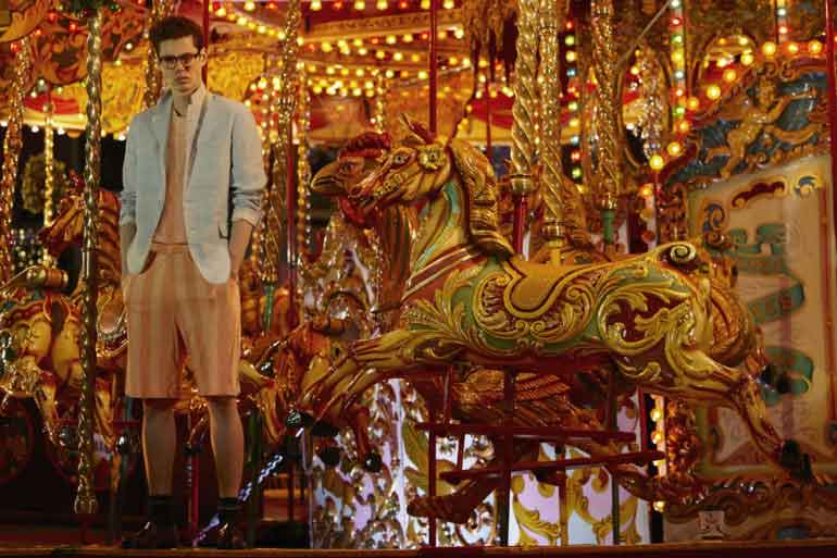 Pale blue cotton blazer PAUL COSTELLOE, cantaloupe and tangerine stripe top and shorts COTTWEILLER, black tiago socks FALKE, burgundy leather penny loafers TODS, black square frame glasses GIEVENCHY
