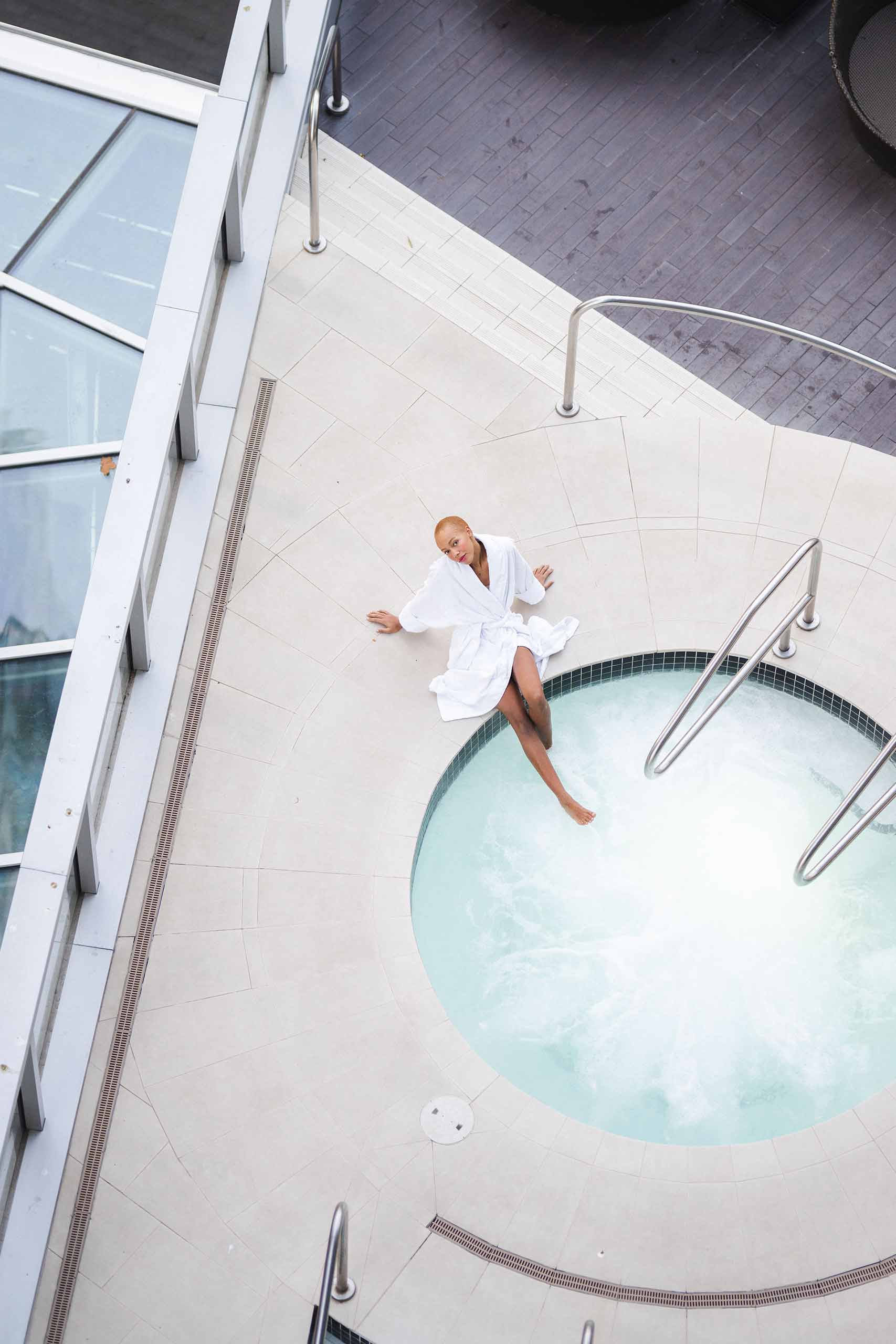 Woman enjoying Shangri-La outdoor whirlpool