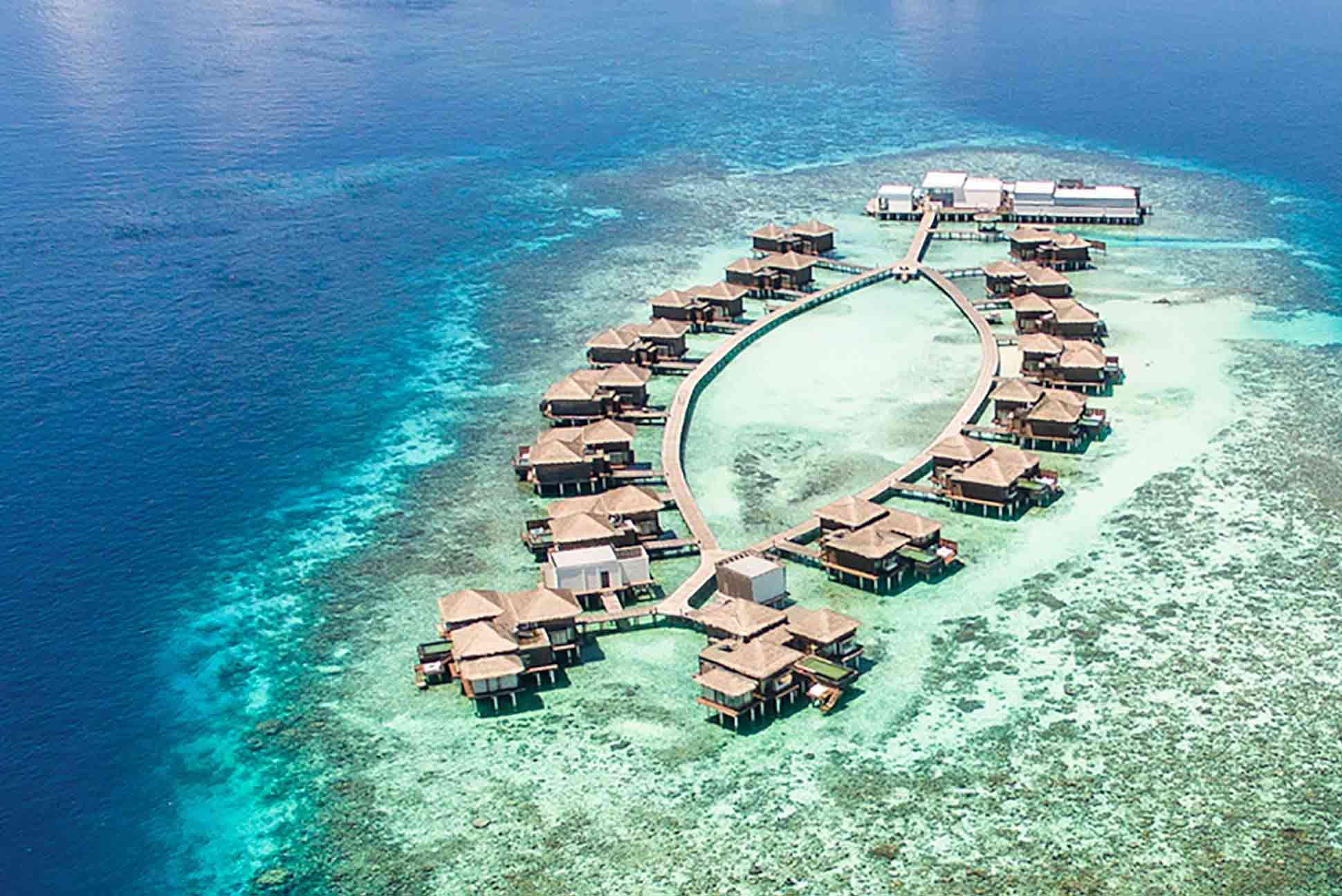 Overwater residences at the Raffles Maldives Meradhoo Resort, Maldives.