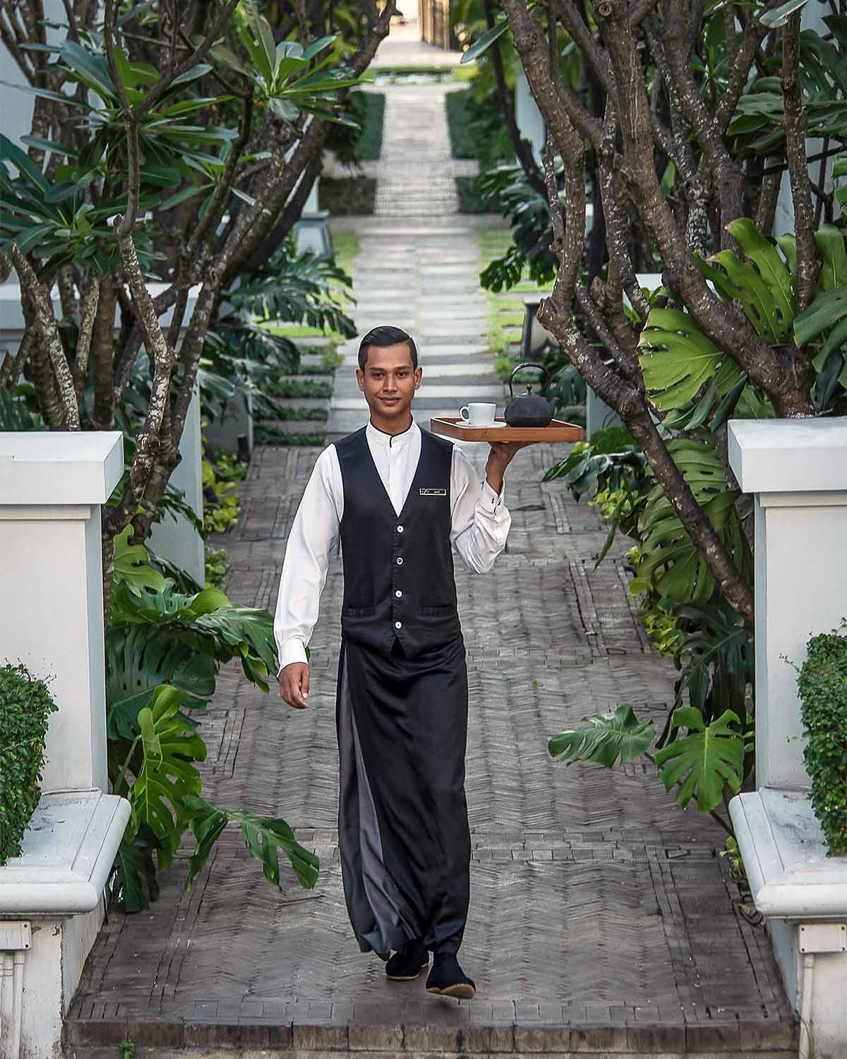 A butler at The Siam, Bangkok, Thailand