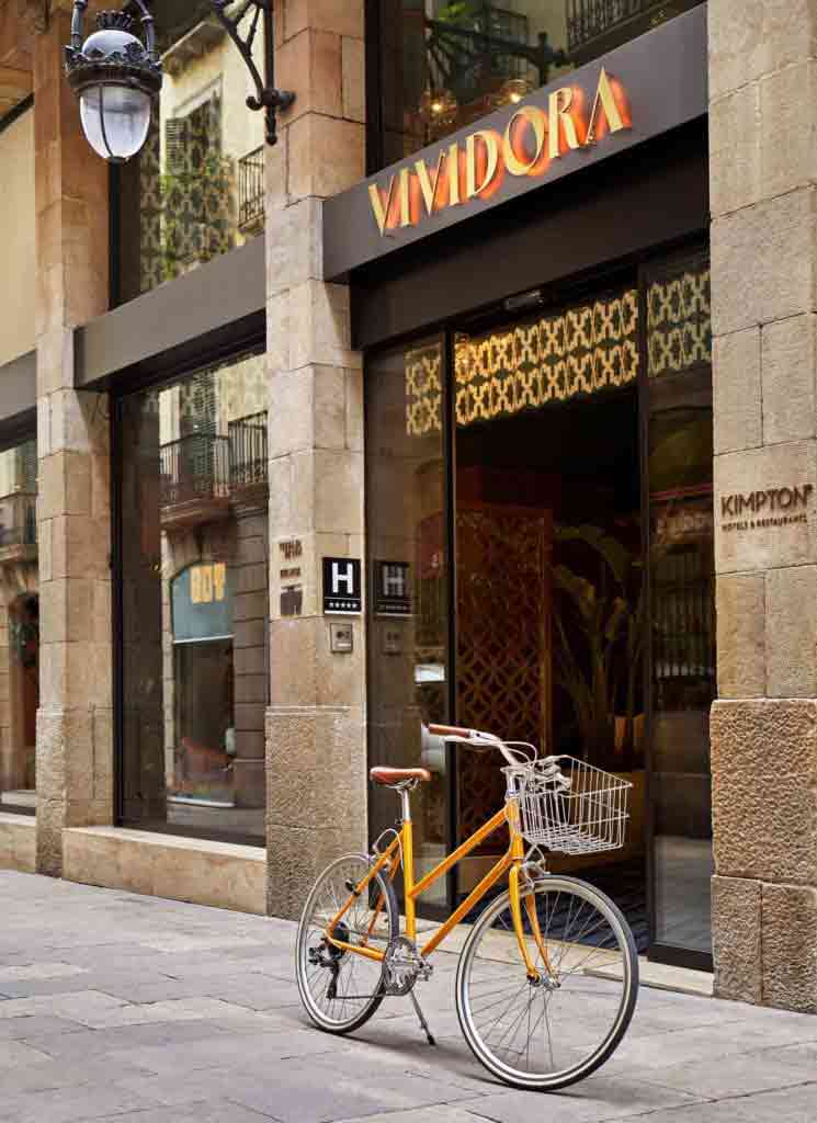 A bike outside the entrance of the Kimpton Vividora Hotel, Barcelona, Spain