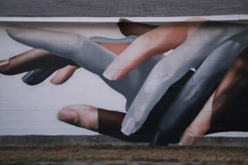 Walls of Women Tennessee murals project hands