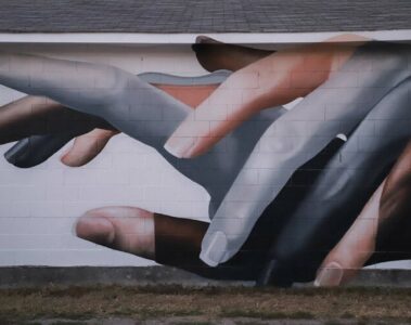 Walls of Women Tennessee murals project hands