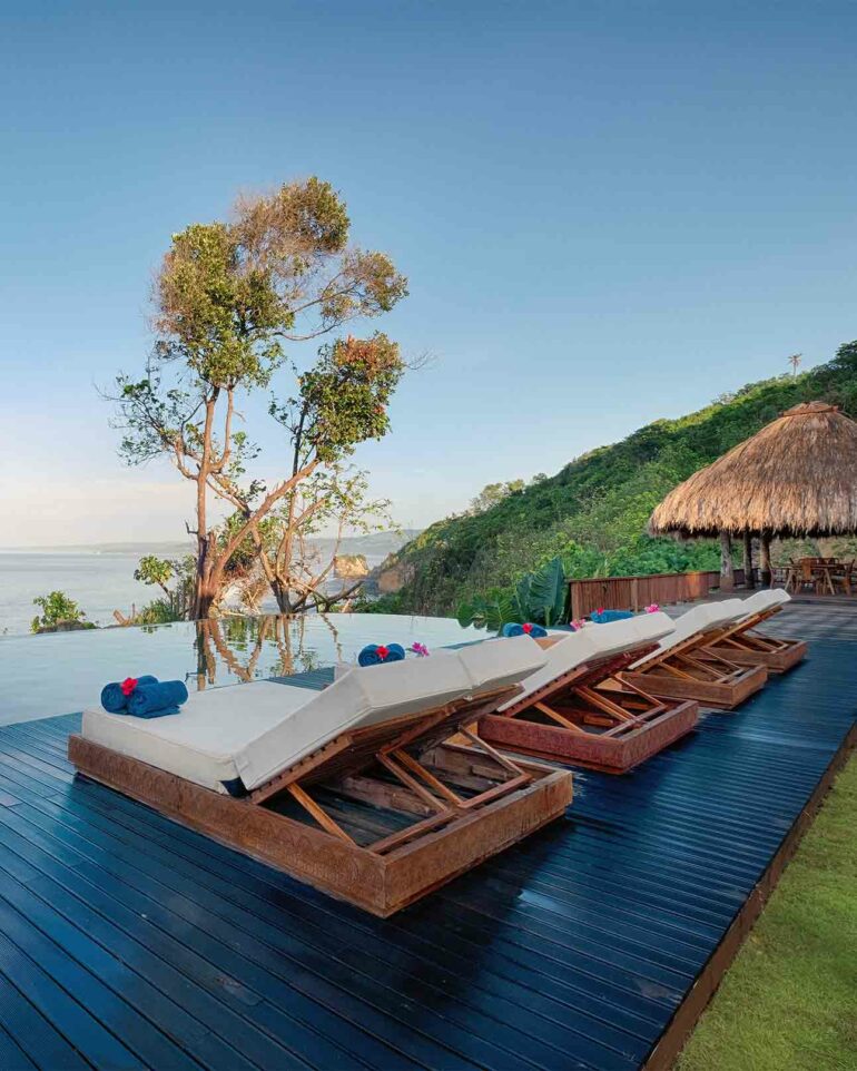 Poolside loungers at Lelewatu Resort, Sumba, Indonesia