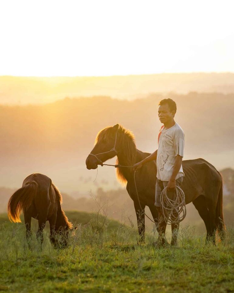 A local with horses outside Lelewatu Resort, Sumba, Indonesia