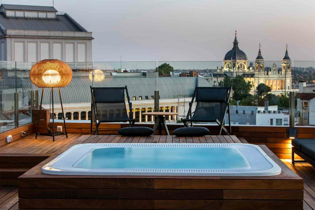 Rooftop jacuzzi with a view at Palacio de los Duques Gran Melia, Madrid, Spain