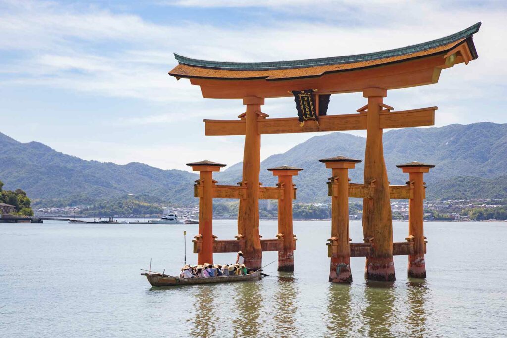 Tourists explore a lake in Tokyo, Japan