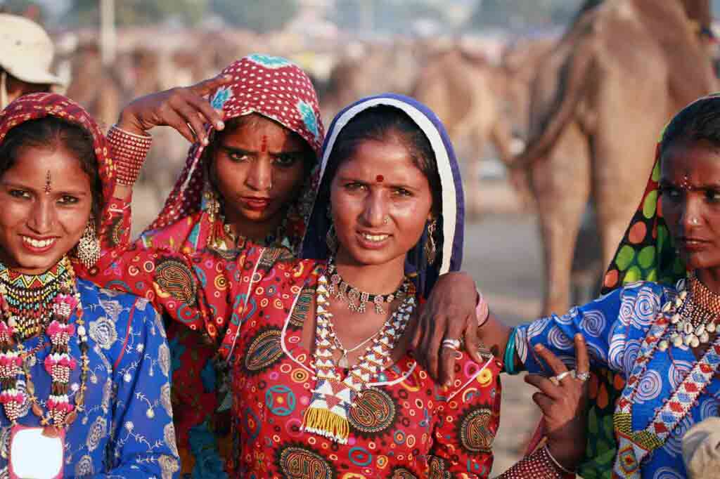 Locals smile for the camera in India