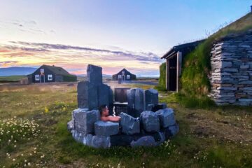 Hot tub under the midnight sun, Torfhus Retreat, Iceland