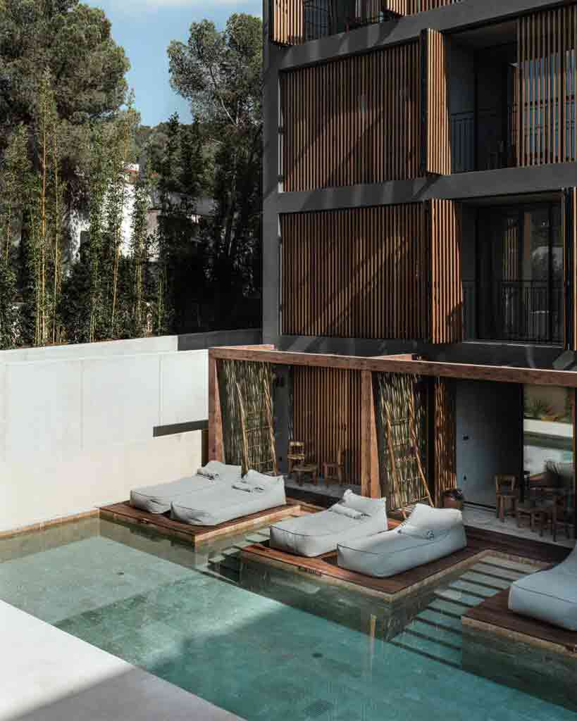 Poolside rooms at OKU Ibiza, Spain