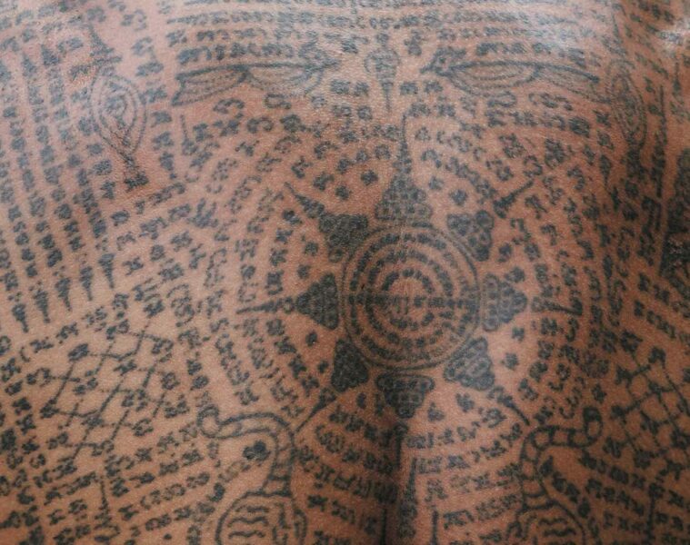 Sak yant tattoo at The Siam Bangkok, Thailand