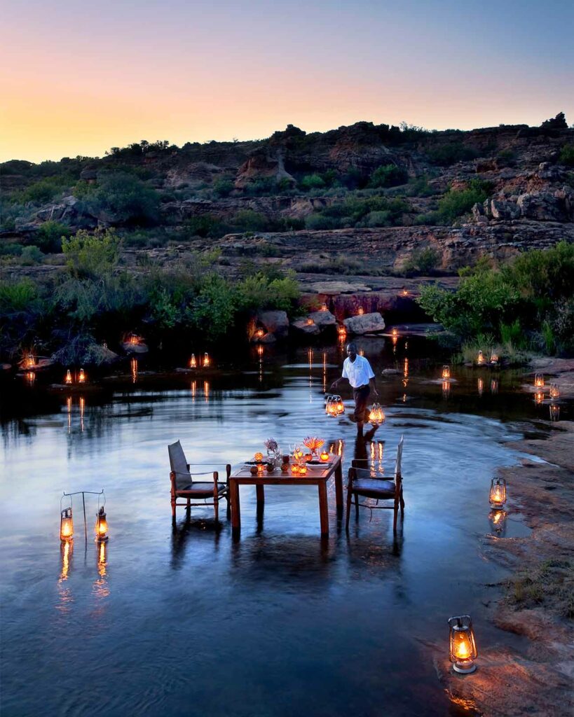 A romantic dinner is being set up at Bushmans Kloof, Western Cape, South Africa