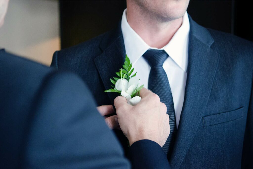 Groom prepares to get married on wedding day