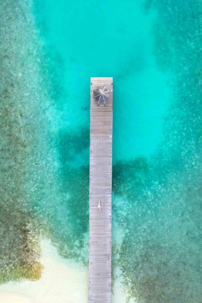 Pier over turquoise waters of Antigua