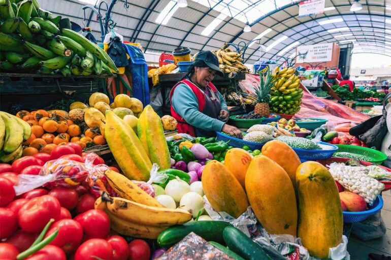 Fruit vendor in an Ecuadorian market