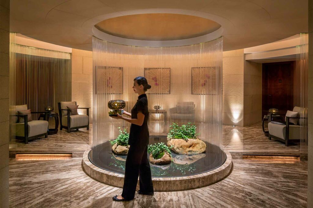 A massage therapist at The Peninsula Hong Kong spa