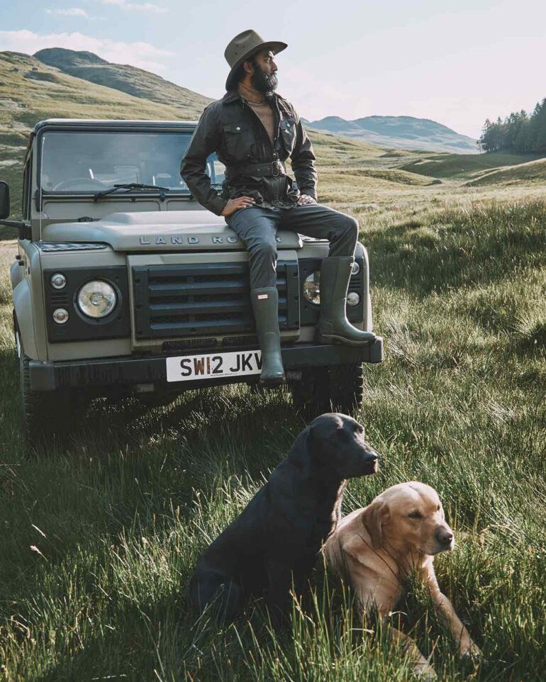 Model with dogs in Glen Artney, Scotland