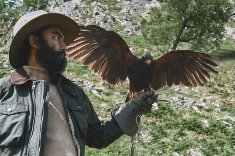 Model with falcon in Glen Artney, Scotland