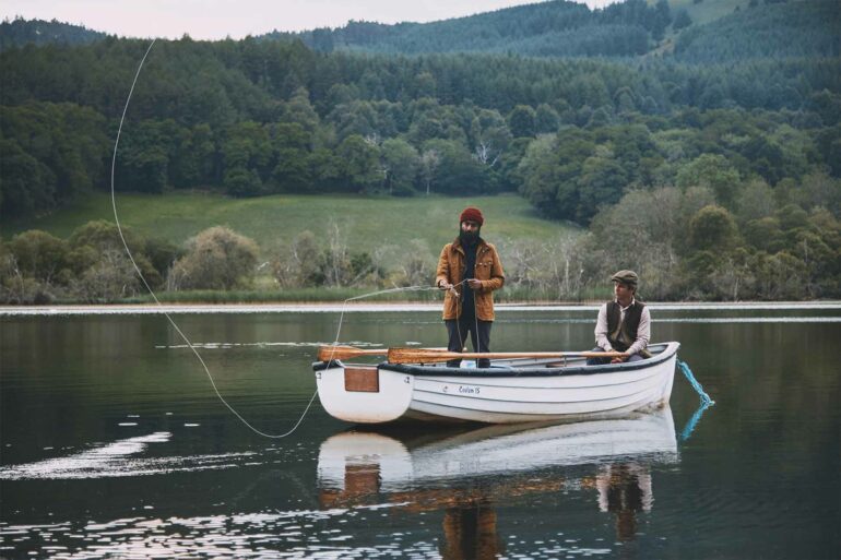 Model on boat in Glen Artney, Scotland