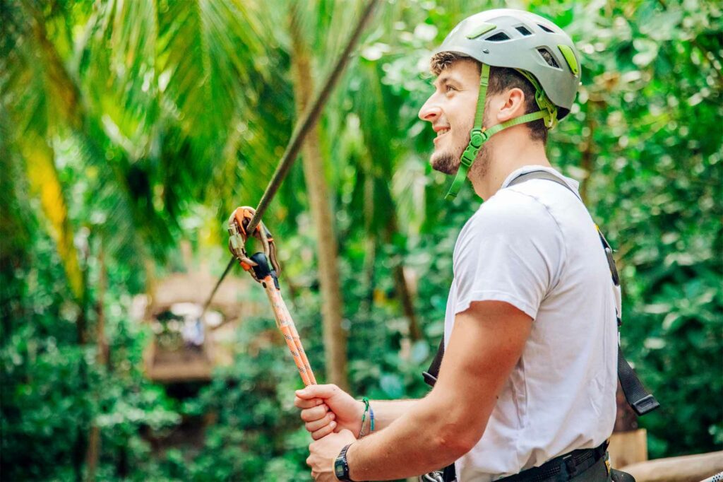 A guest gets ready to zip line in the Maldives