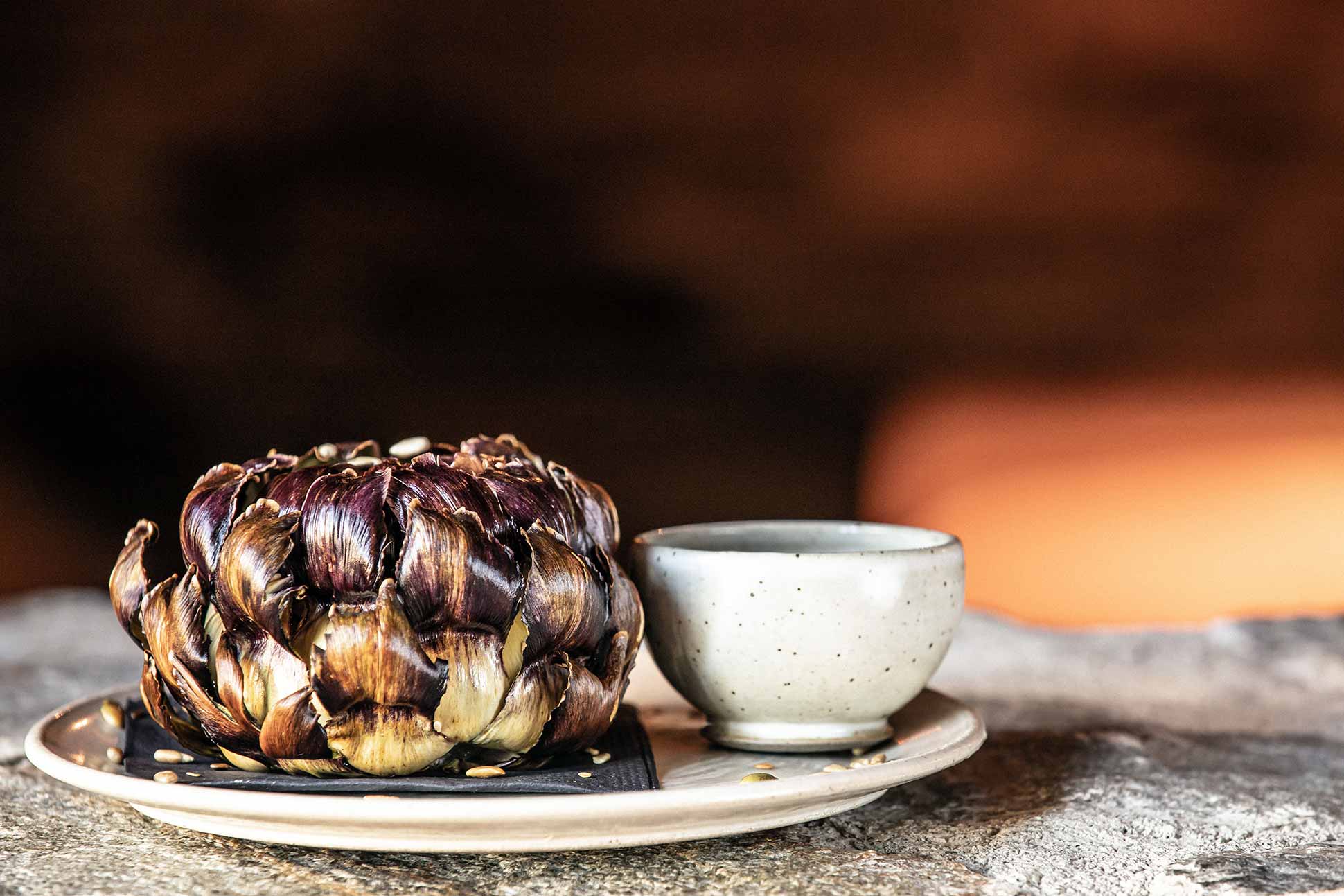 An artichoke served at La Ferme de Mon Pere at Zannier Hotels Le Chalet, Megève, France