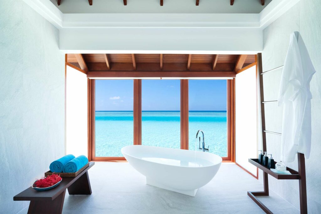 Overwater bathroom at the Anantara Dhigu Maldives Resort, The Maldives