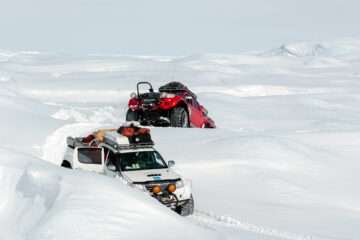 Snow SUVs on expedition in Greenland with Ariodante Travel