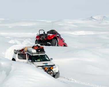 Snow SUVs on expedition in Greenland with Ariodante Travel