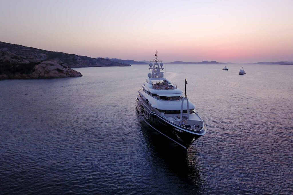 A yacht at sunrise, MYBA, The Worldwide Yachting Association