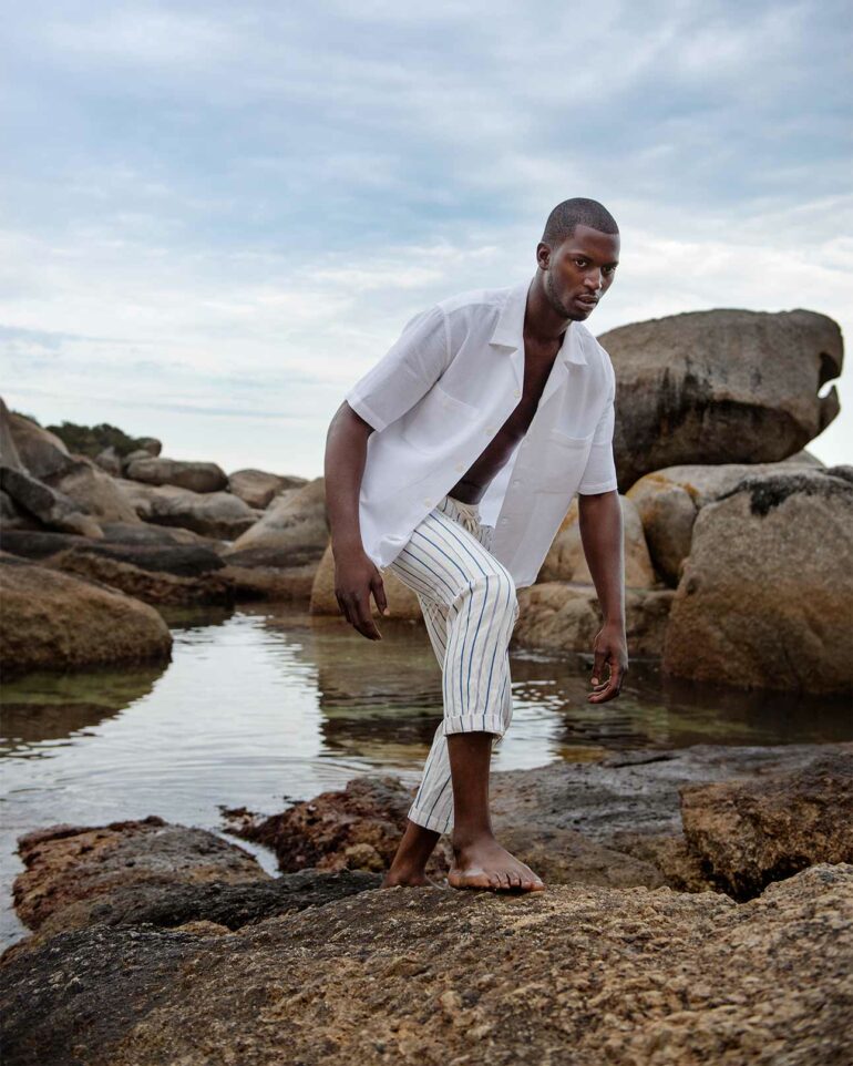 Model David J. Kabamba on the shores of Cape Town, South Africa