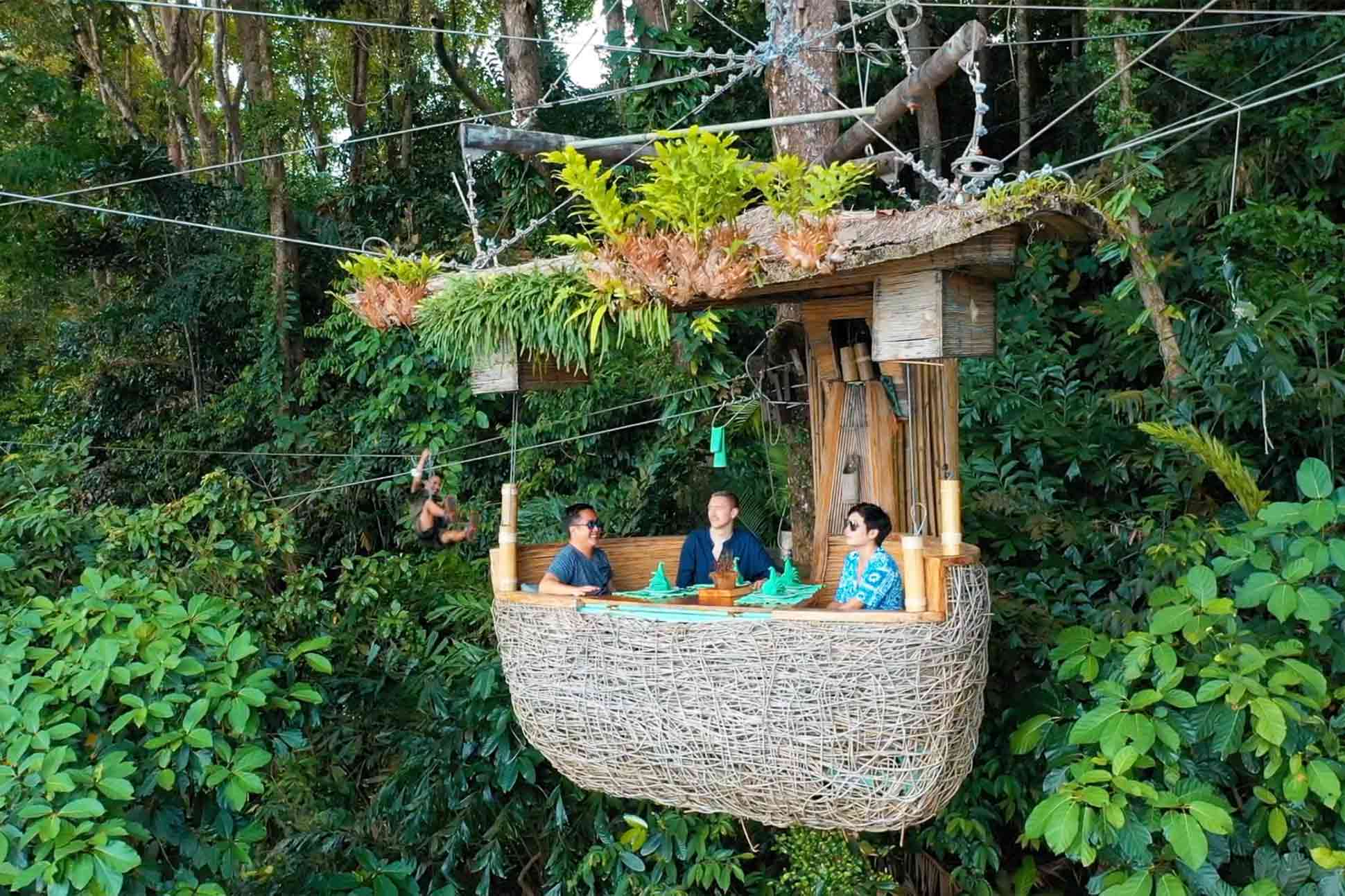 Uwern Jong, Martin Perry and Ohm Mornphan treepod dining at Soneva Kiri