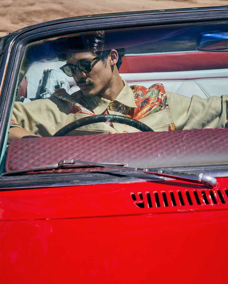 Model parks red car for day by the beach, Phuket, Thailand
