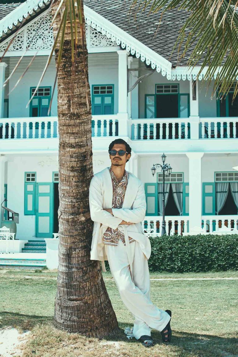 Model pictured outside heritage villa, Phuket, Thailand