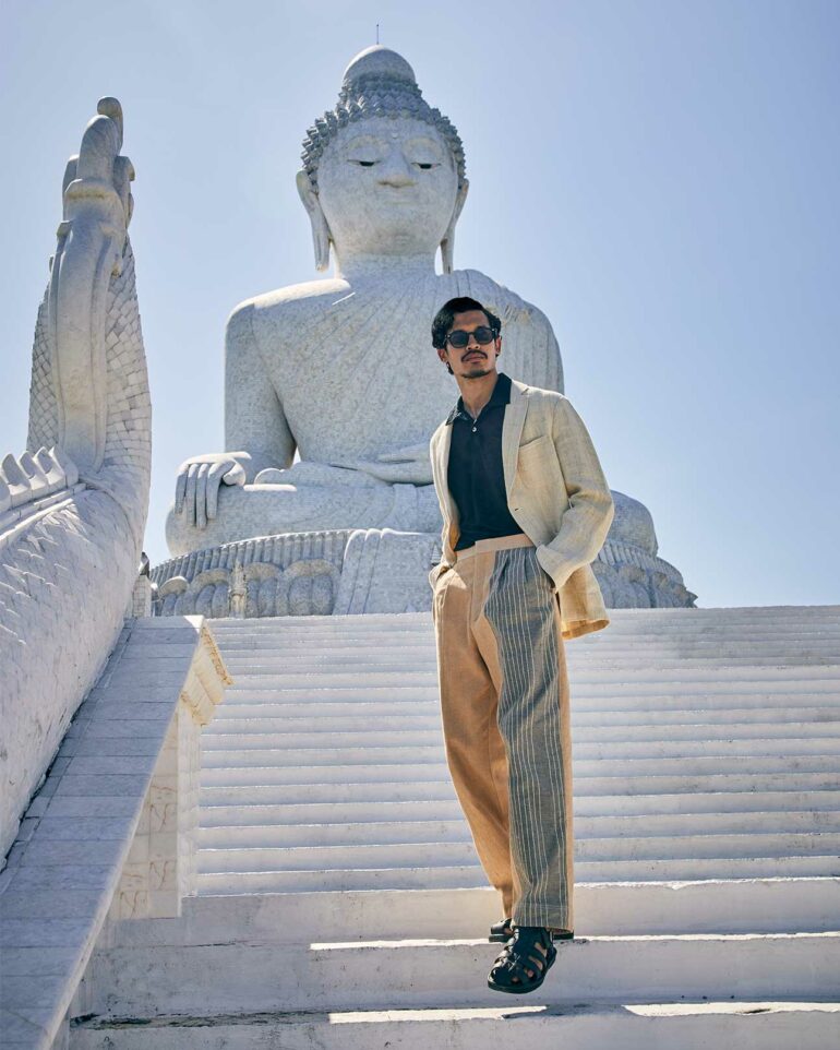 Model walks up stairs to the Big Buddha, Phuket, Thailand