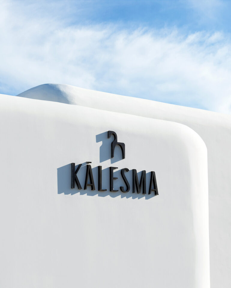 Logo on the wall at Kalesma, Mykonos, Greece