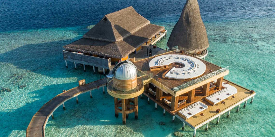 Aerial of overwater observatory at Anantara Kihava Maldives Villas, The Maldives