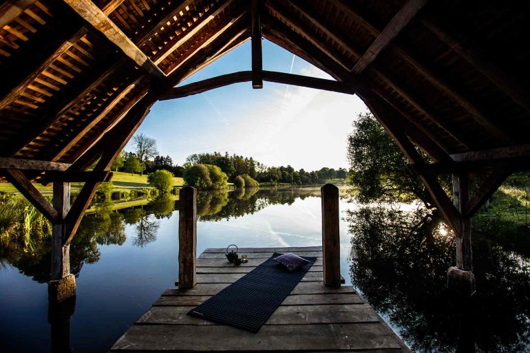 Lakeside yoga at Domaine des Etangs, Massignac, France