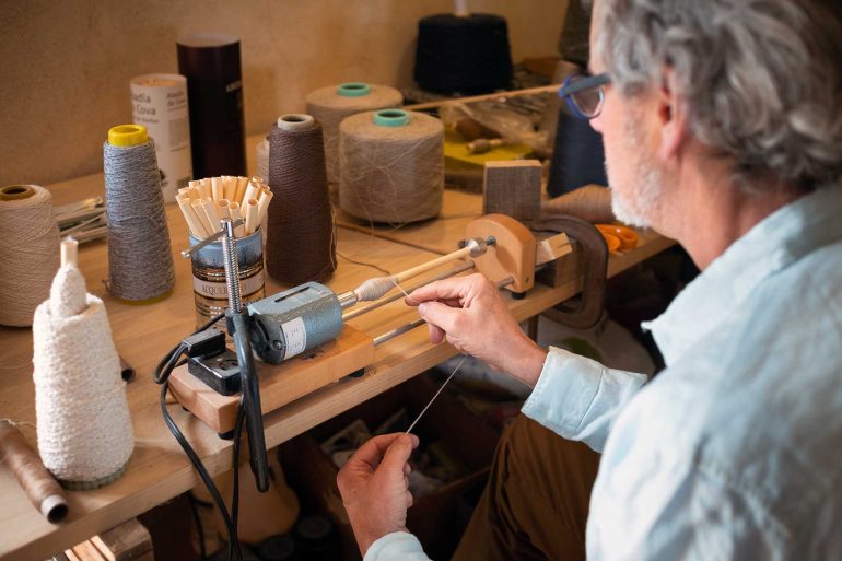 Sam Kasten working with yarn in Charente, France
