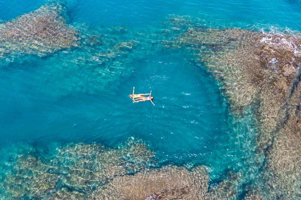 LGBTQ couple enjoying the blue sea in the Canary Islands