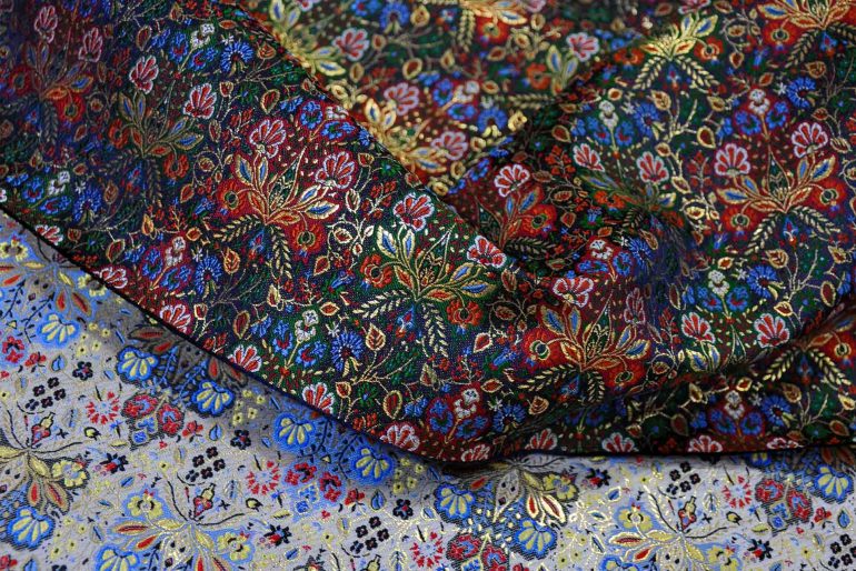 Fine fabrics on sale at Bilal Abu Khalaf's store in Jerusalem, Israel