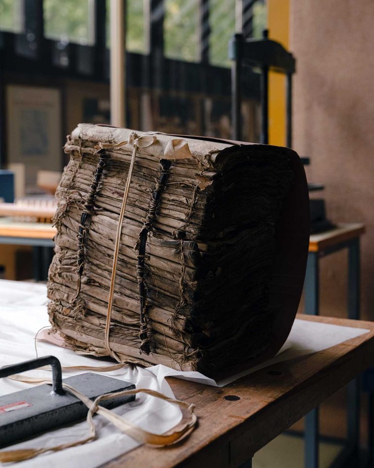 A pile of documents hundreds of years old at the Florence State Archive, Italy