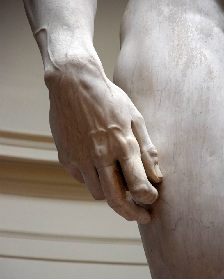 Detail of Michelangelo's David statue in Florence, Italy
