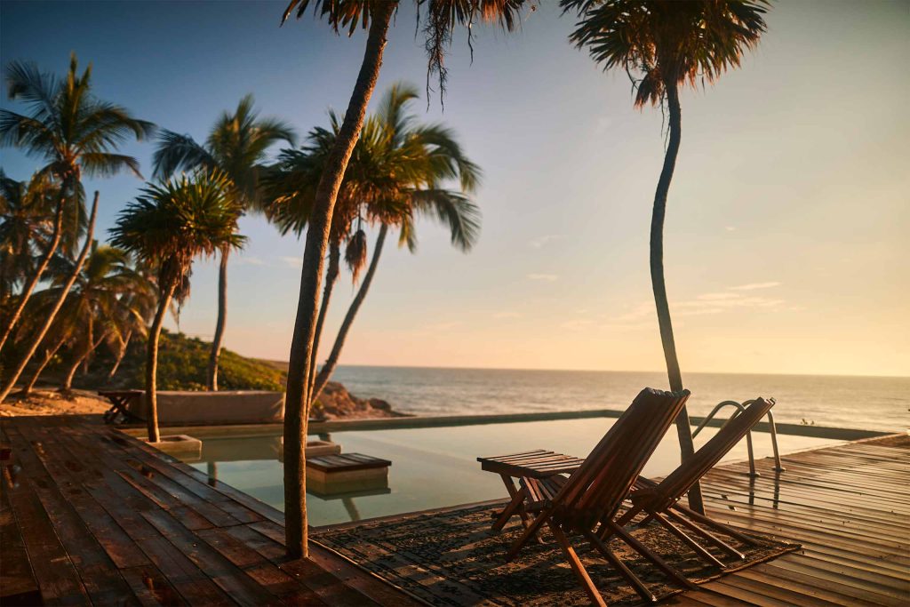 Poolside loungers at Habitas Tulum, Riviera Maya, Mexico