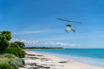 Helicopter landing at Miavana by Time + Tide, Madagascar
