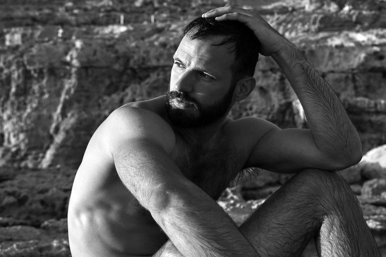 Malta looks over his shoulder in Comino, Malta