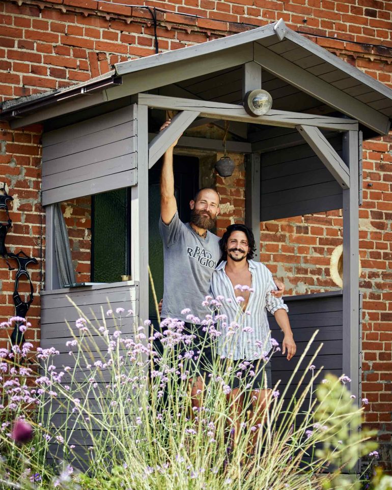 Andreas Zaremba and Gary Ebla pose for a picture at Hof Flieht, Uckermark, Germany