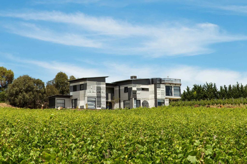 Hotel California Road at Inkwell Wines amongst lush green fields in McLaren Vale, Australia